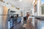 Stainless steel appliances and all the accoutrements for family meals